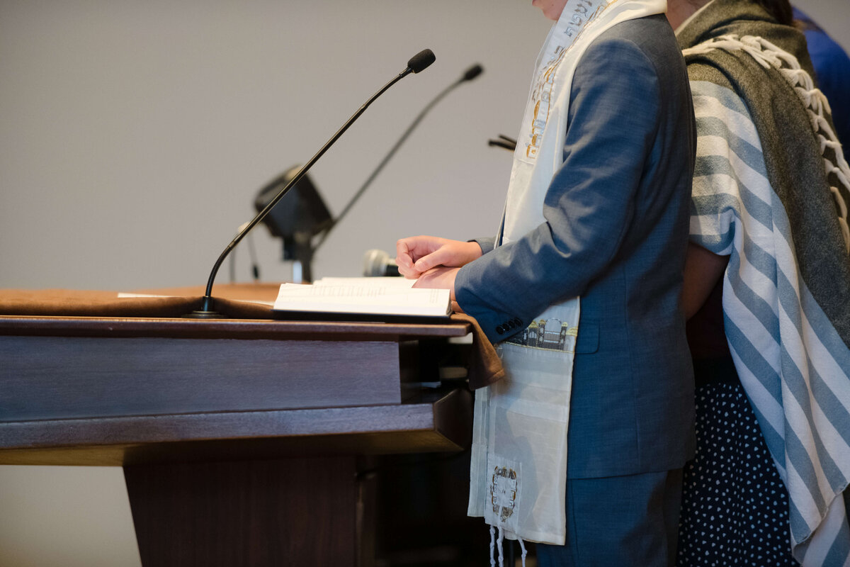 Boy reading from the Torah for his Bar Mitzvah Ceremony