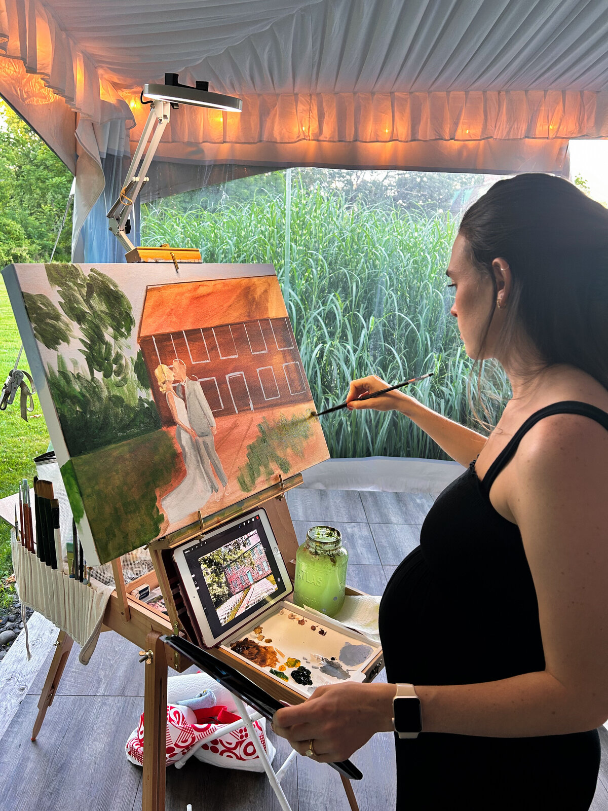 Hannah Brauckmann painting a live wedding painting 18x24 in Pennsylvania 