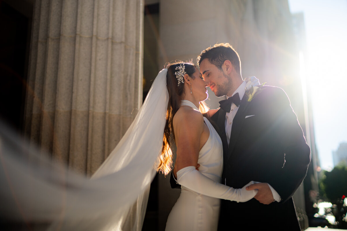 Professional Bay Area wedding photographer captures cinematic moment at historic Merchants Exchange Building in San Francisco Financial District