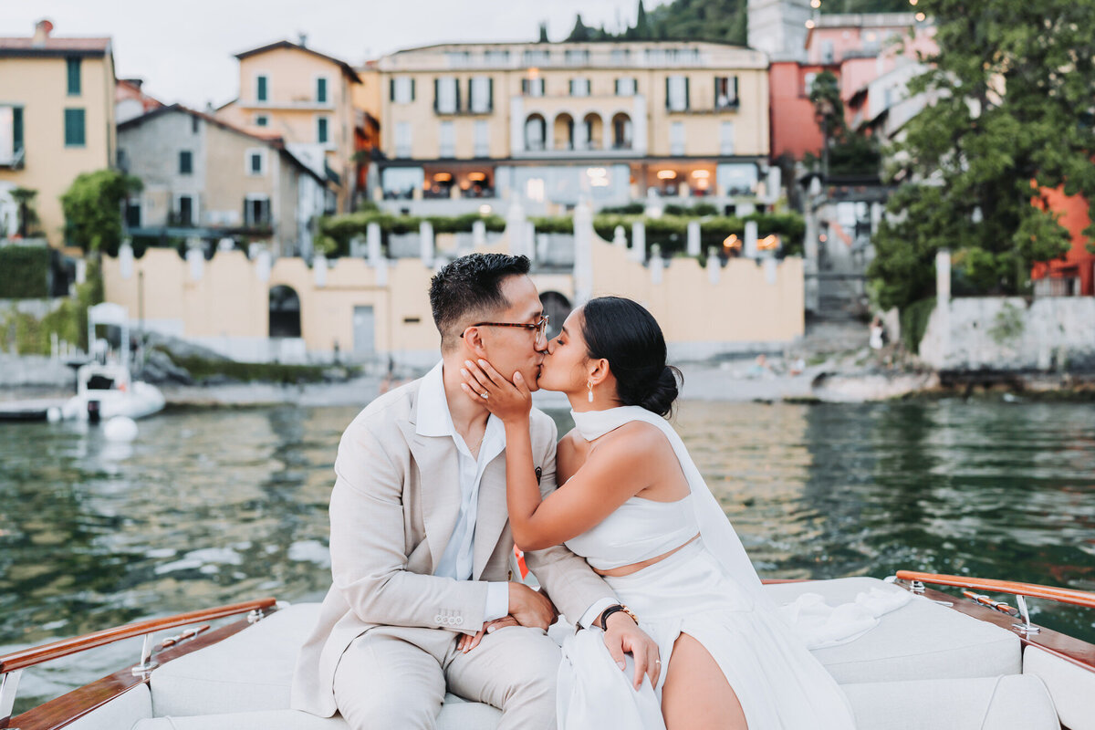 Bride grabs groom's face and kisses him