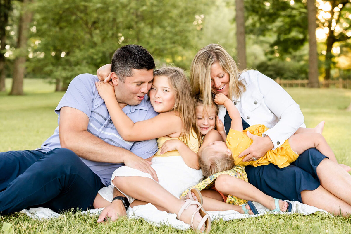 Chicago family with three little kids having a blast at family session near Naperville, IL.