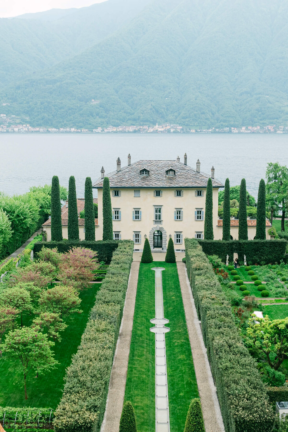 A wedding aerial drone photo of the wedding venue villa balbiano on lake como in italy
