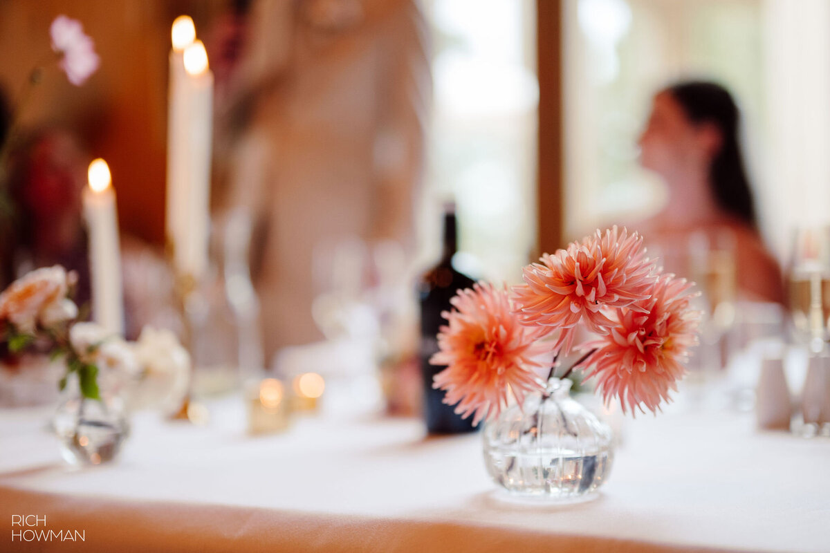 Bud vase with dahlias at wedding breakfast