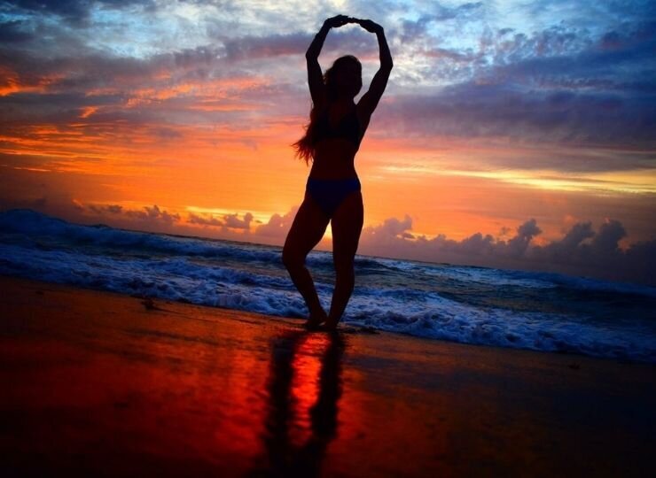 beautiful-women-beach-sunrise-florida-ocean-yoga-colorful-sky
