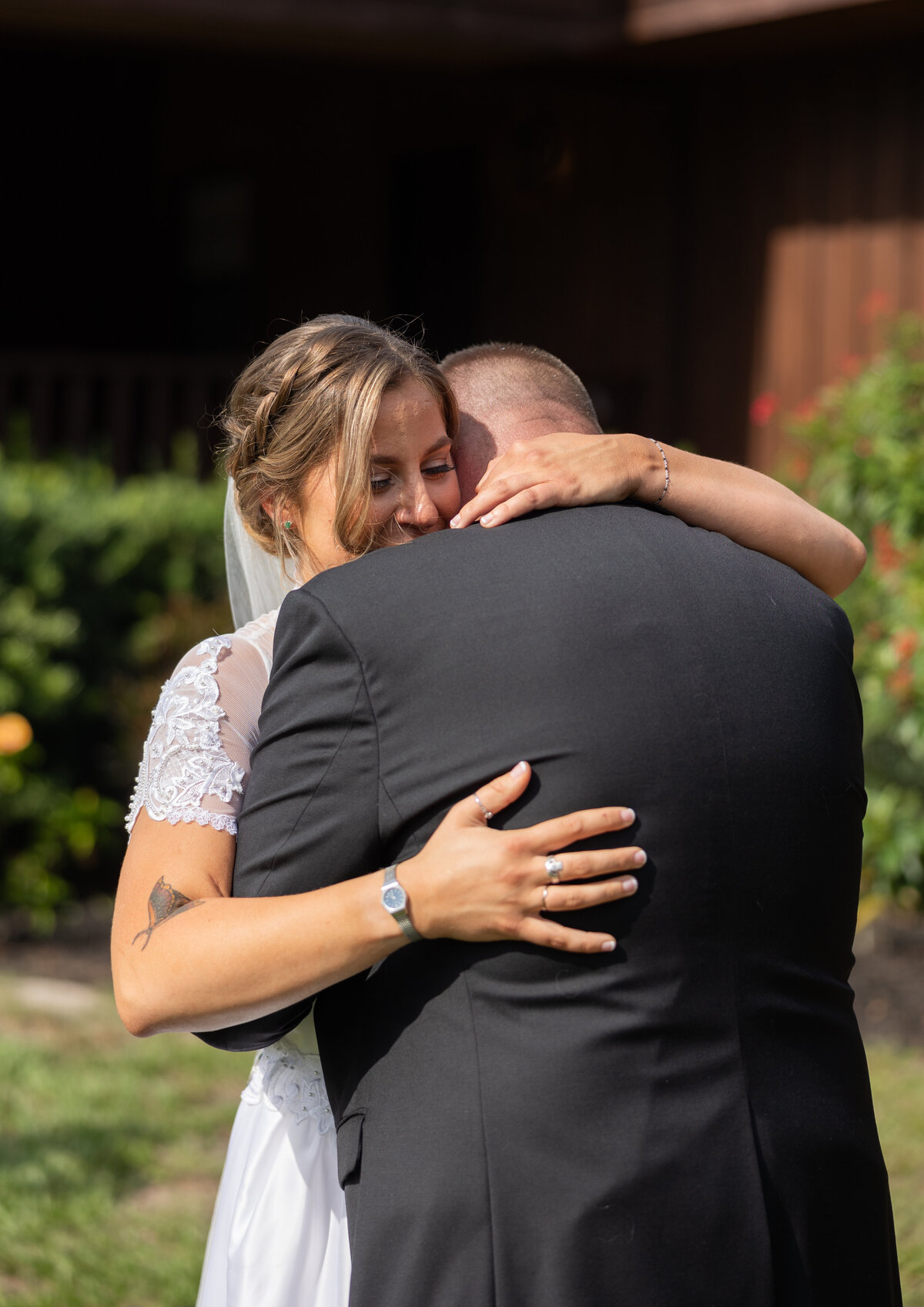 brides first look with dad wearing black suit at Cypress Creek Farmhouse in Astatula Florida by Amanda Richardson Photography