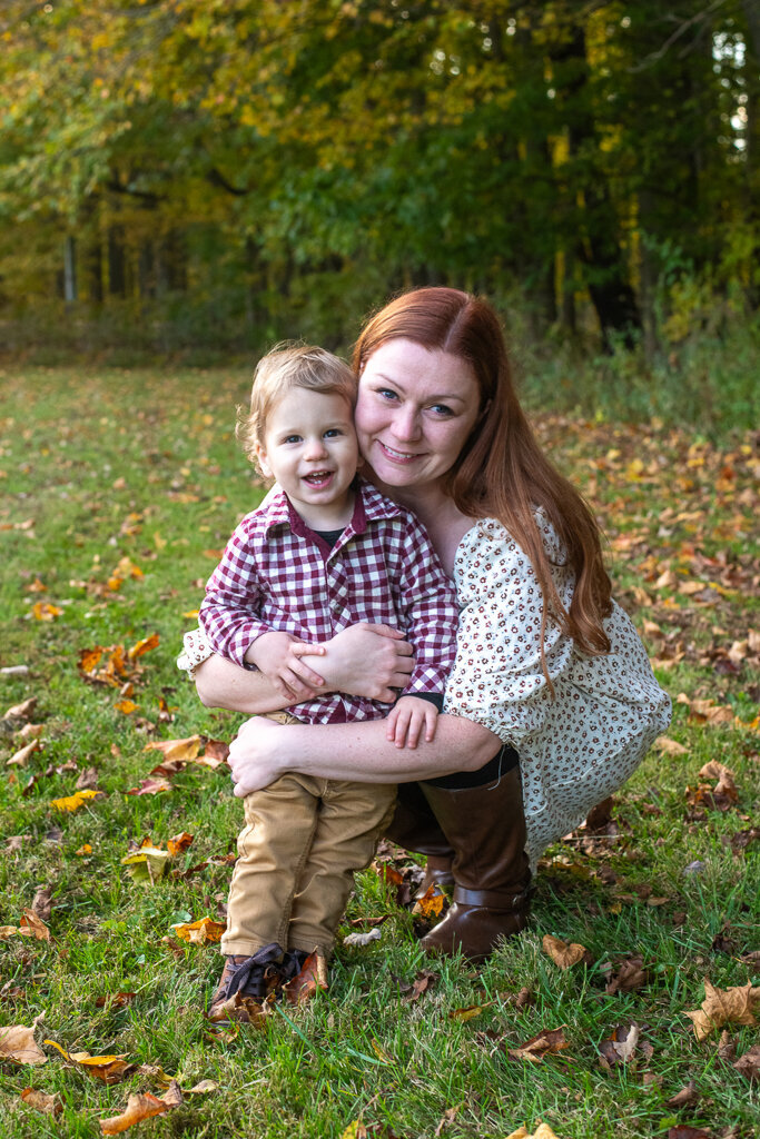 Mom happily hugging her son