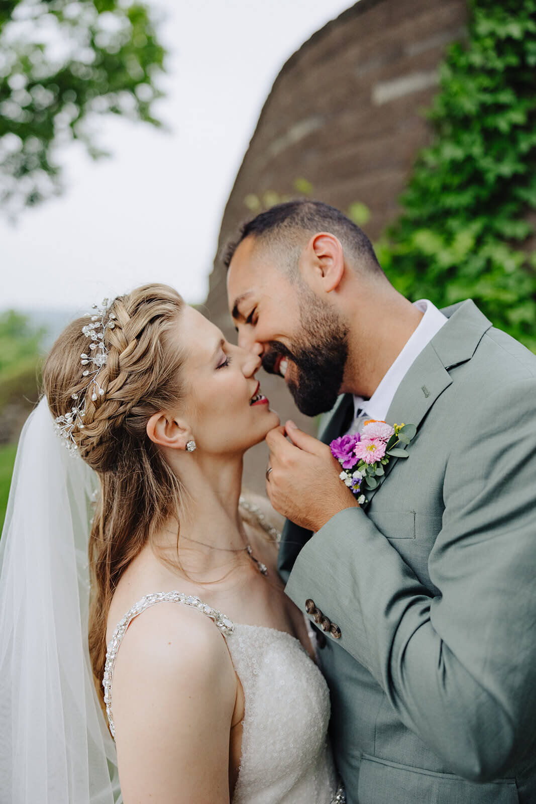 Bride and groom kissing at Mansion at Keuka Lake wedding, NY