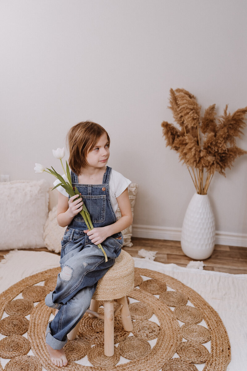 Girl holding flowers