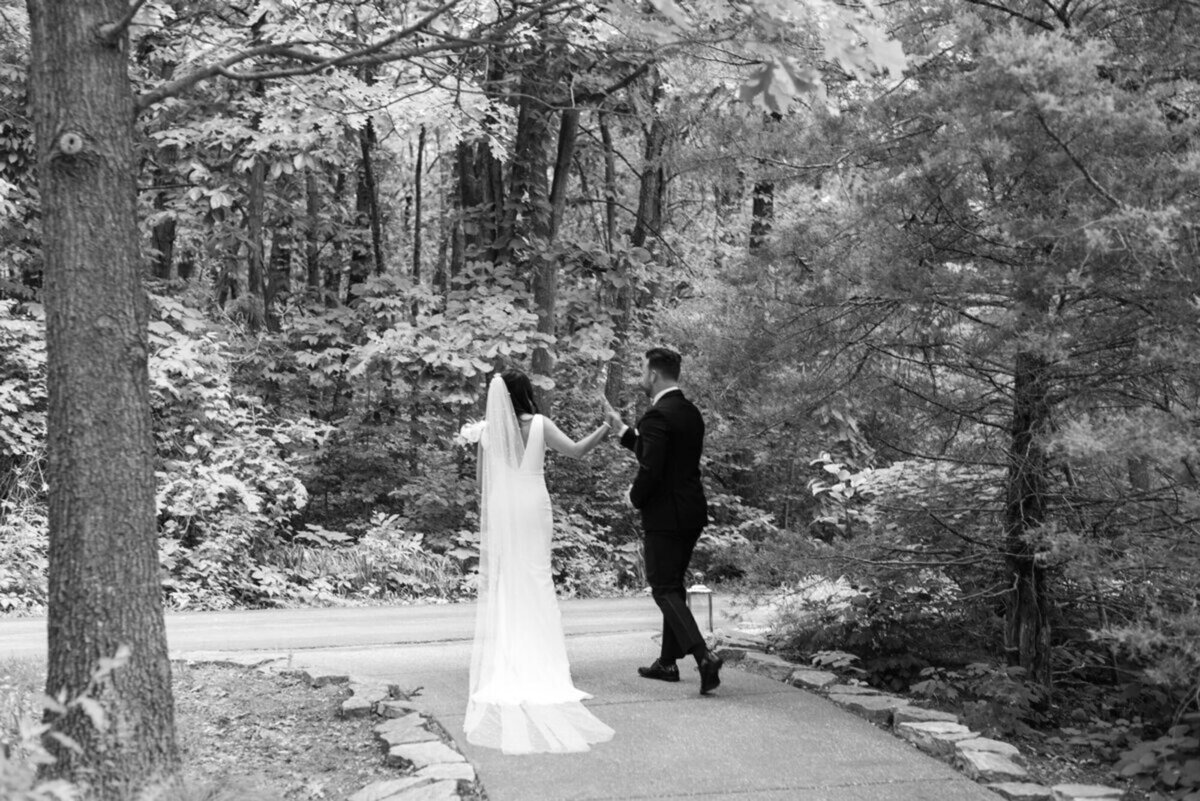 Bride and groom dancing after wedding ceremony, taken by top wedding photographers in Cincinnati