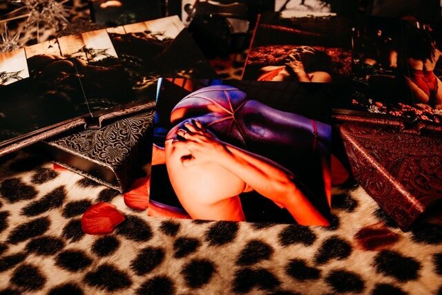 Boudoir photography keepsake images on leopard rug in Lubbock, Texas photographer in Amarillo TX