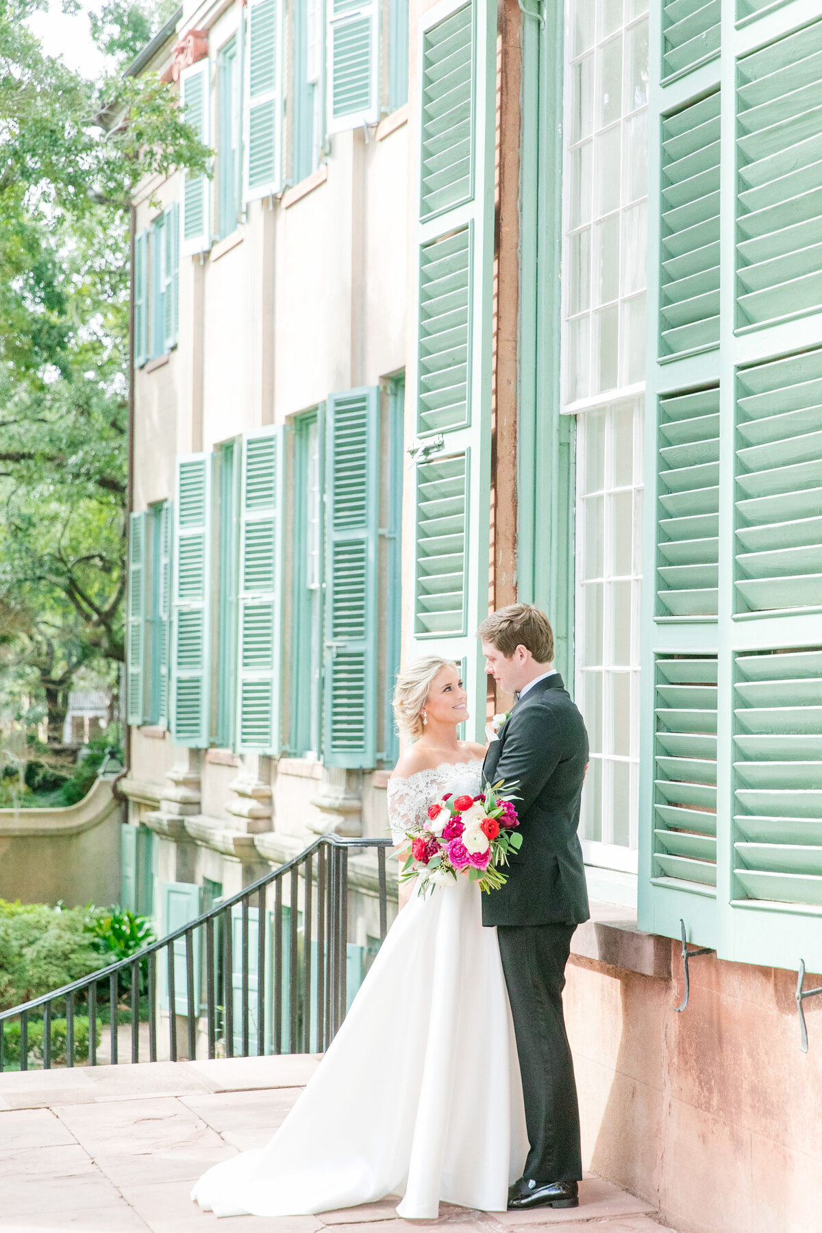 bride and groom at college of charleston cistern
