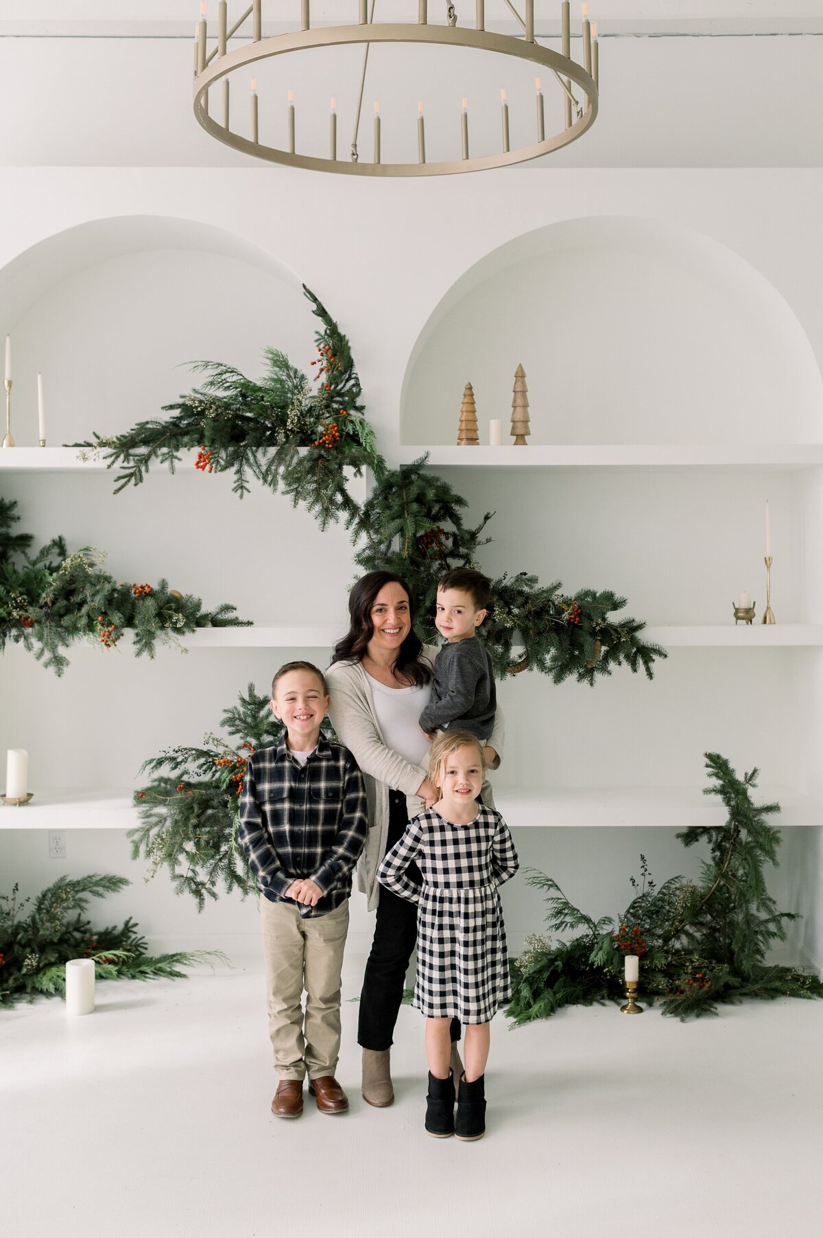 Family in black and white with Christmas scene