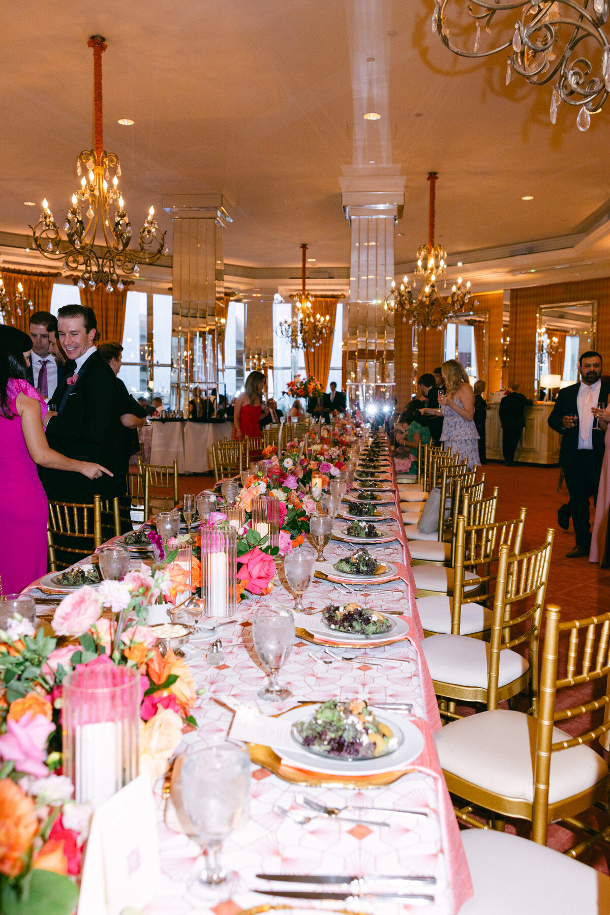 A wedding day photo of the reception hall and tables