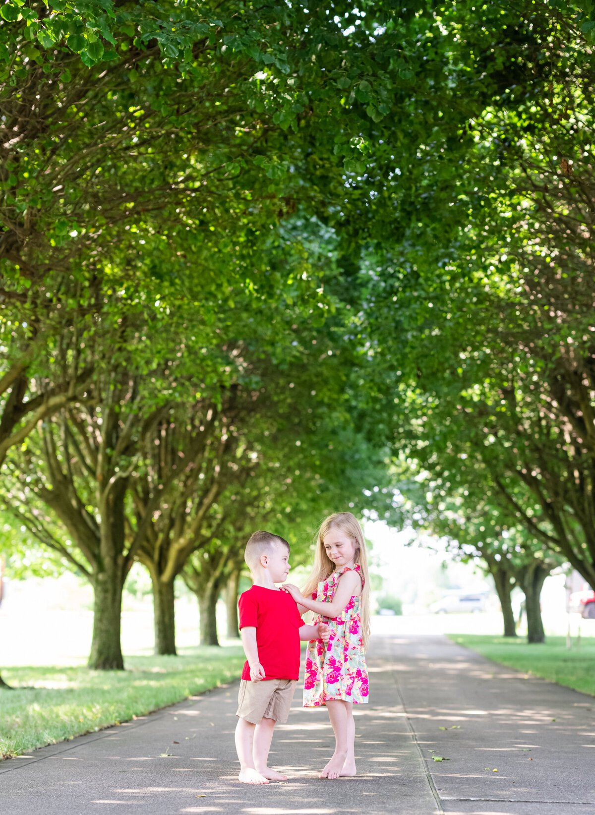 siblings on walking path