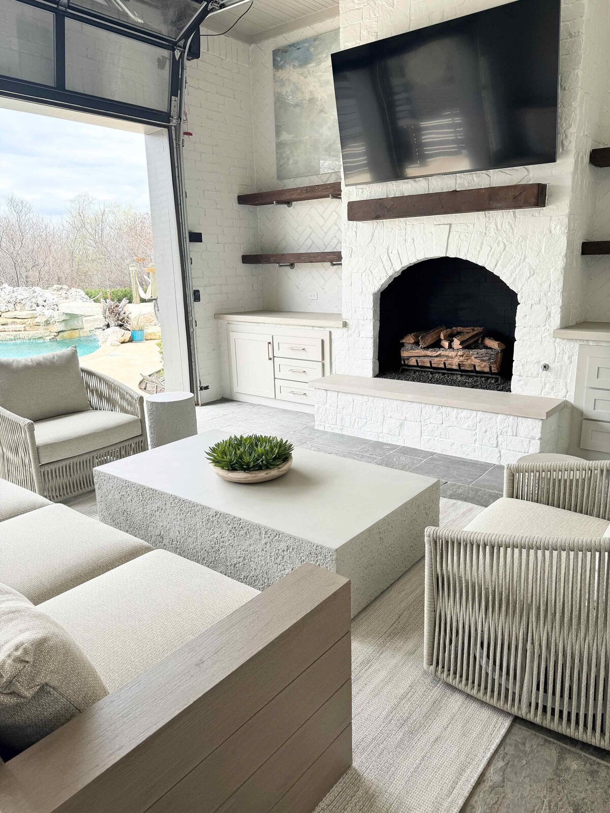 Home interiors crafted with care for a white, elegant living room, featuring sophisticated furniture and a serene, stylish atmosphere perfect for relaxation and entertaining.
