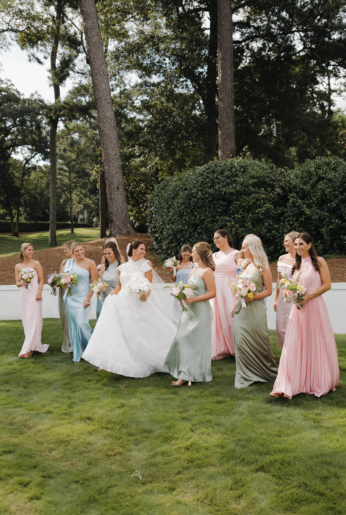 Bride walking with her Bridesmaids at Mountain Brook Country Club