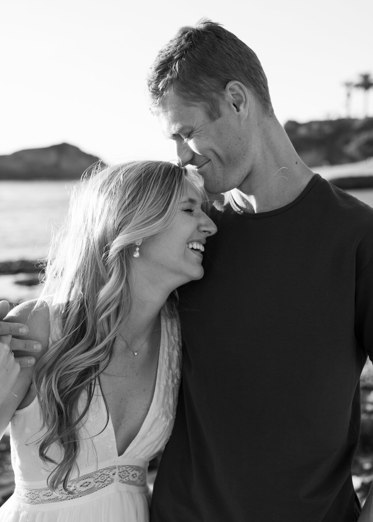 sweet black and white beach engagement photo