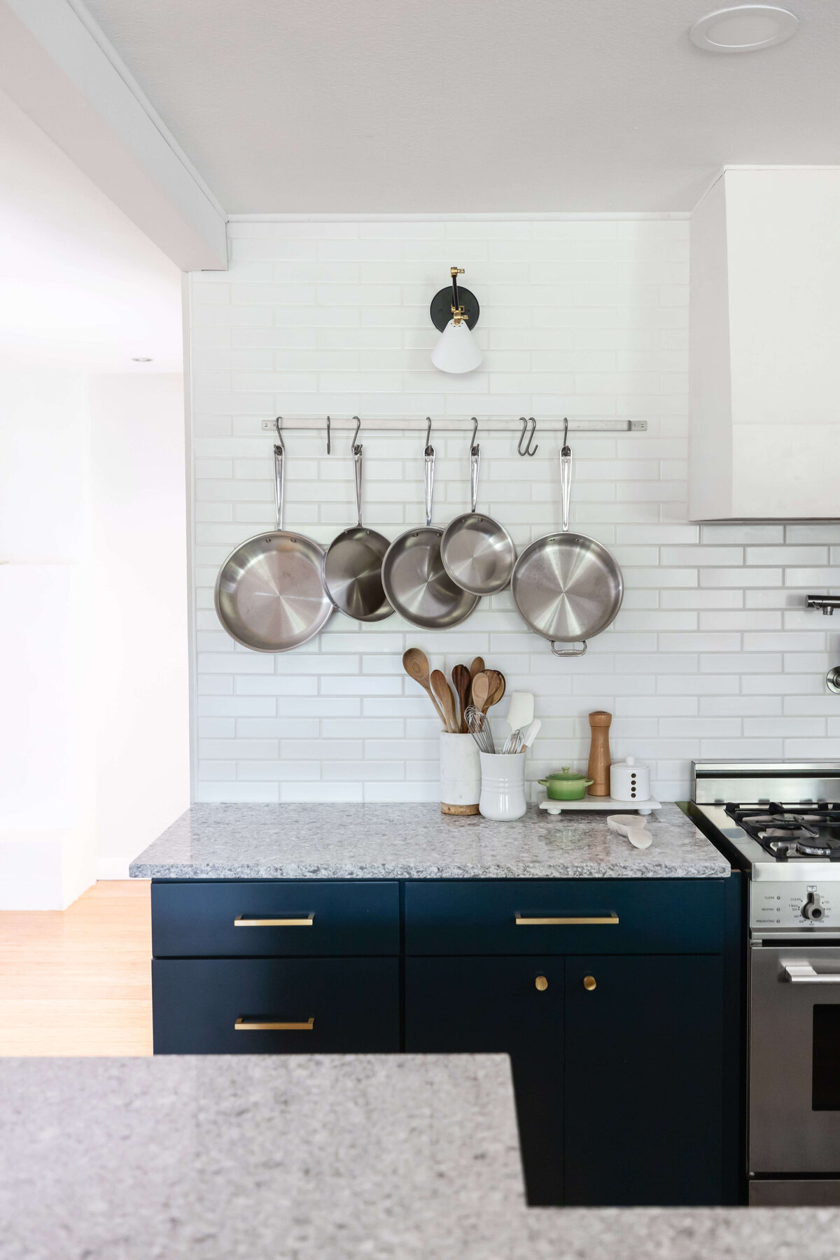 hanging pot rack white subway tile classic kitchen (1)