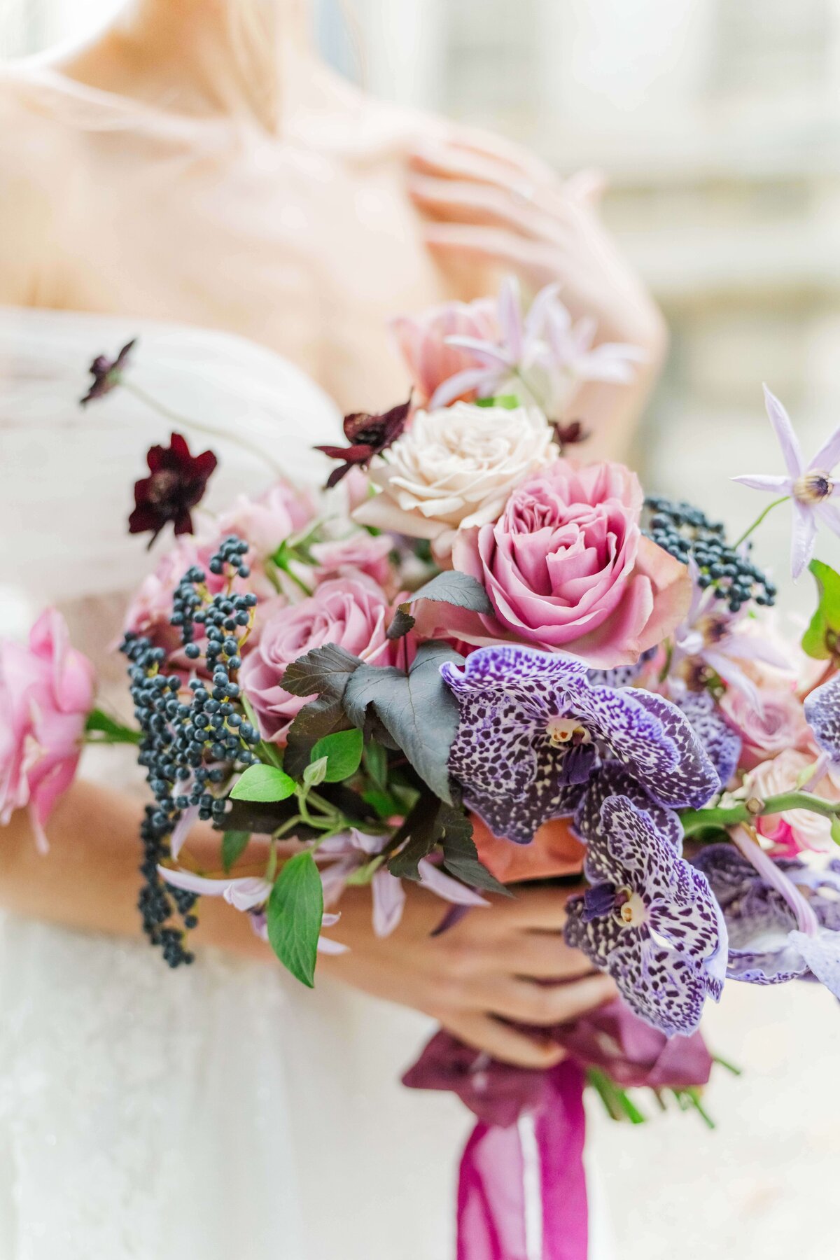 wedding bbouquete with pink and purple flowers