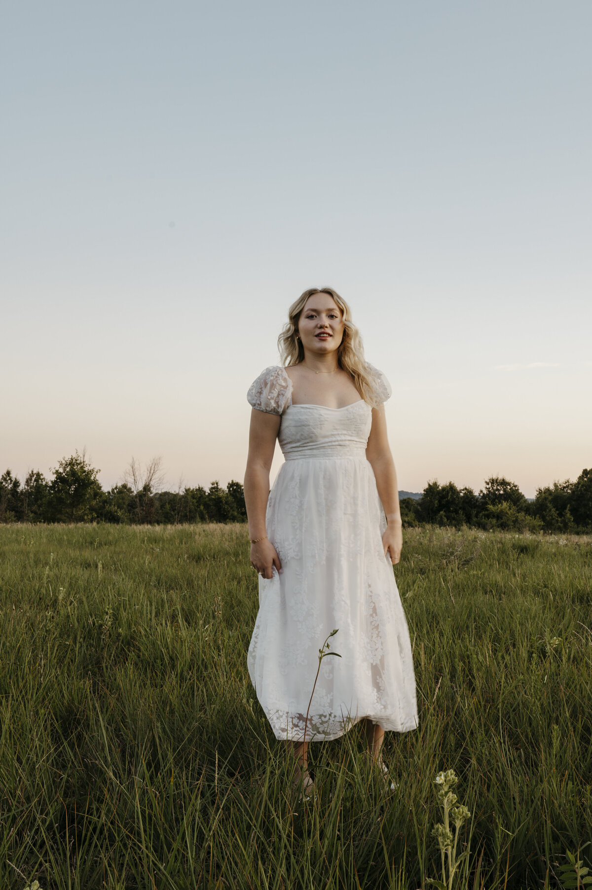 Girl in white dress during golden hour