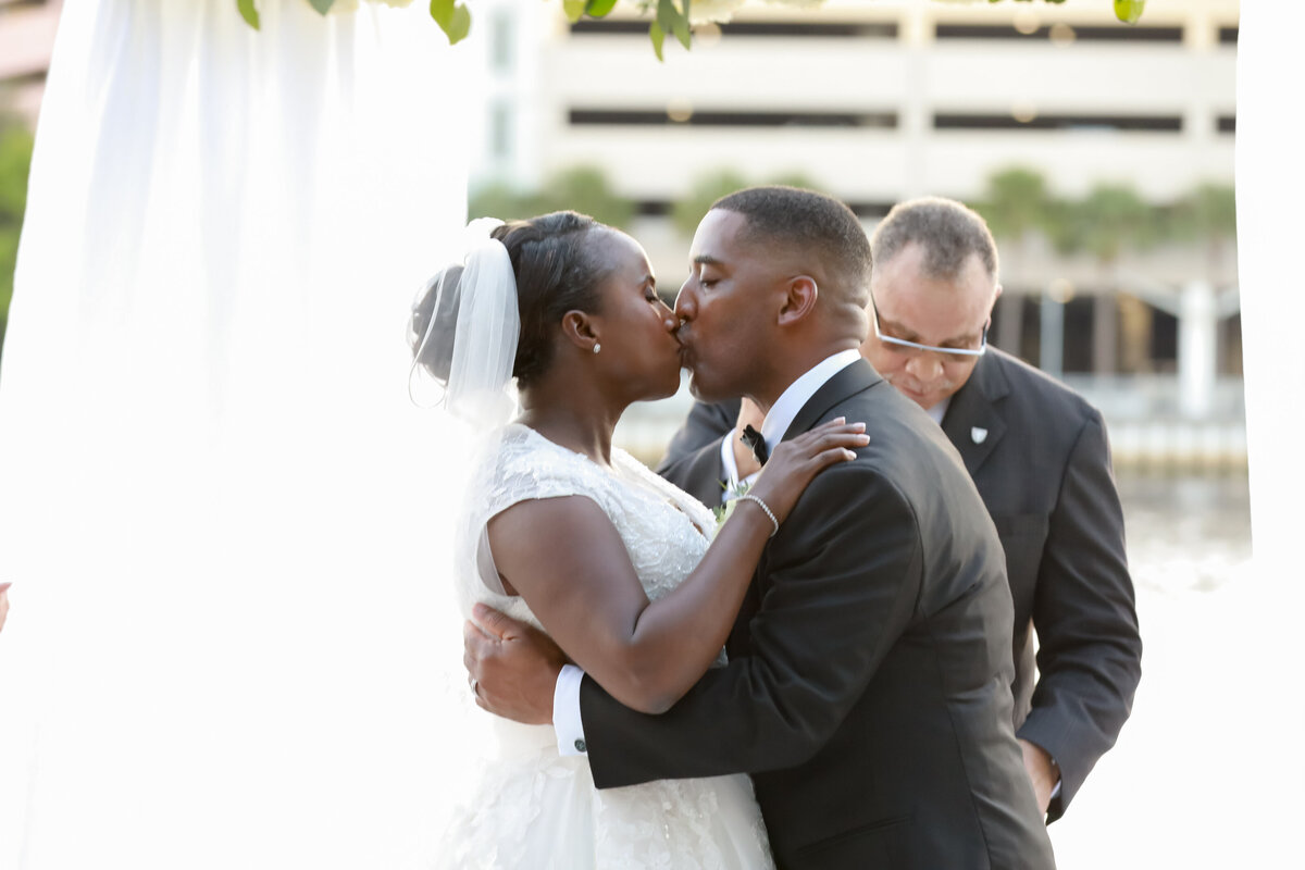 13 - Westin Tampa Wedding Ceremony Kiss - Tampa Bay Wedding Planner