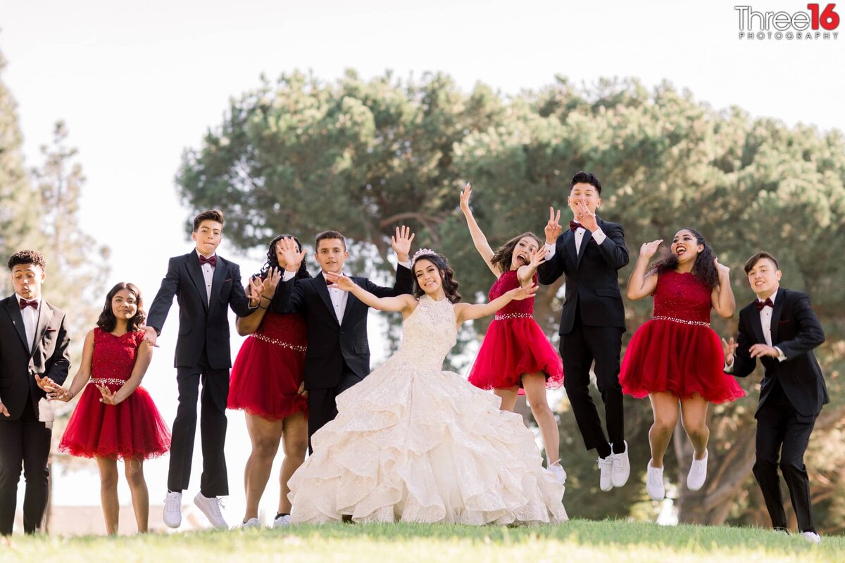 Quinceanera party jumps to celebrate the young lady being honored