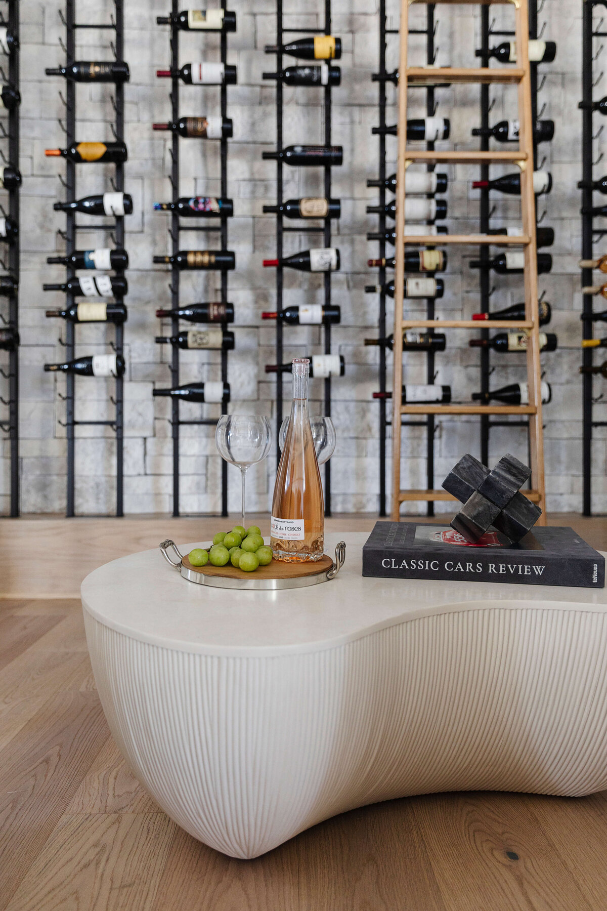oyster creek studios hughes wine shelving with white accent table