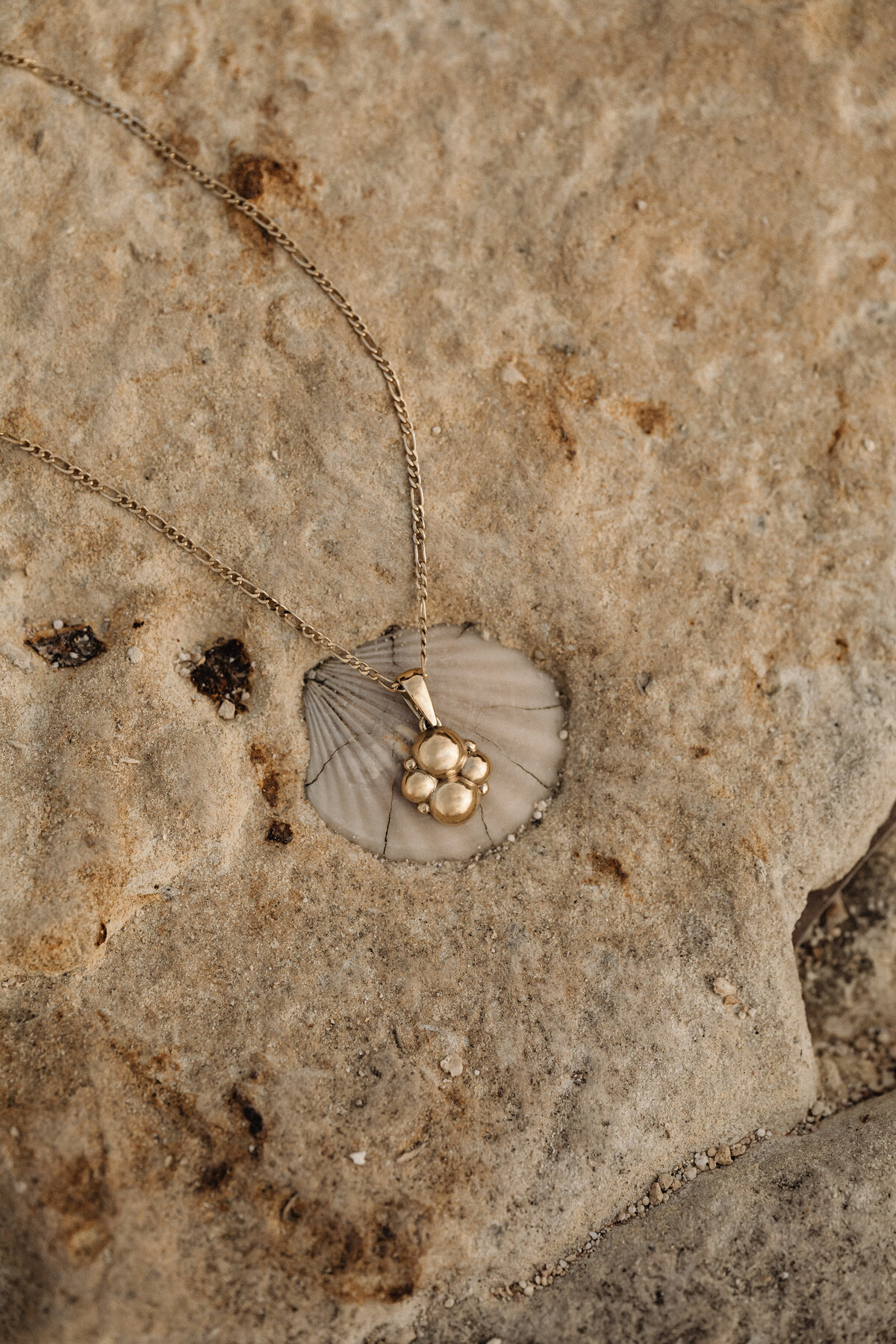 kaboompics_simplicity-by-the-sea-minimalist-jewelry-on-maltas-rocky-beach-31097