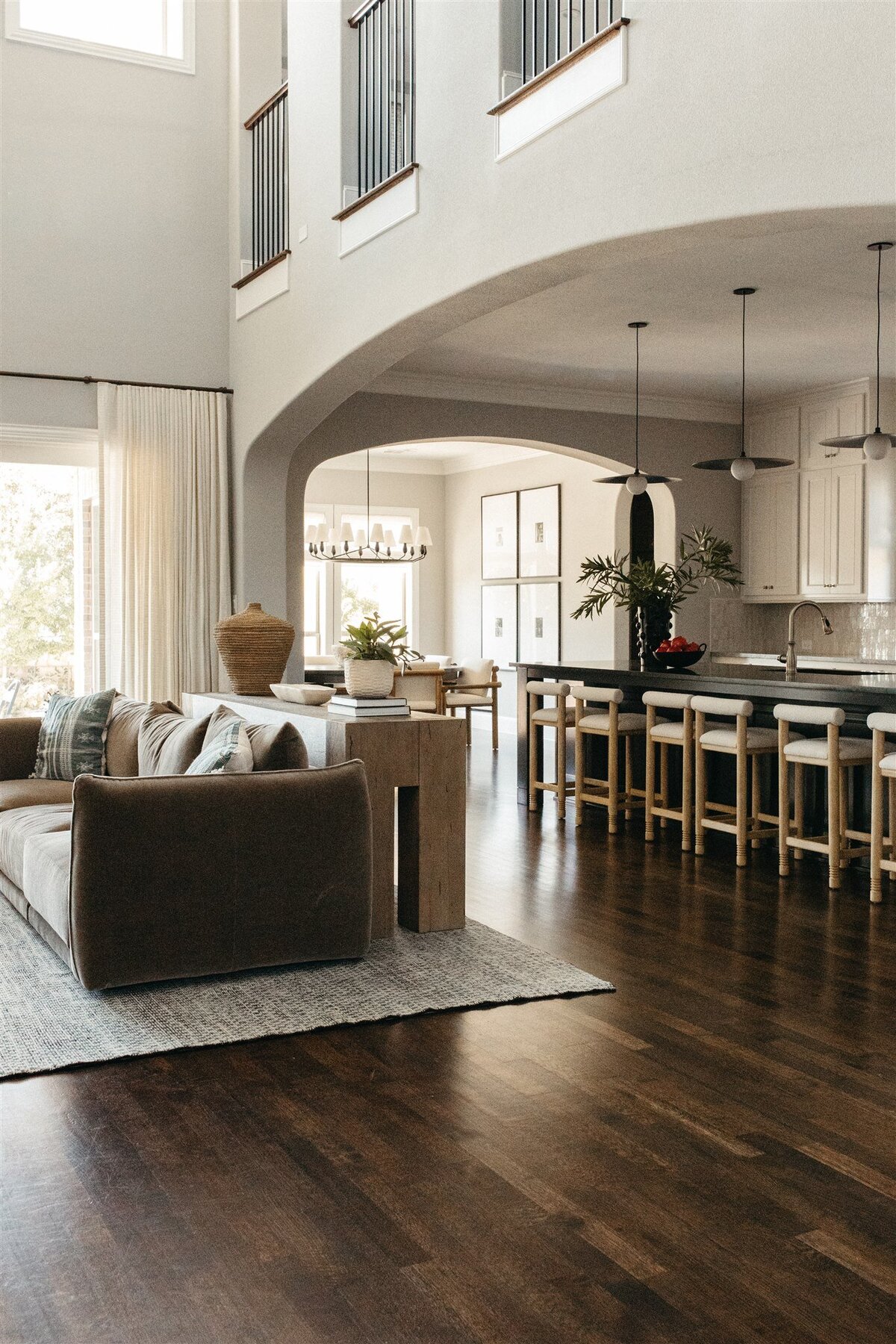 Minimalist, unique living room and kitchen designed by Hope Miriam Designs in DFW