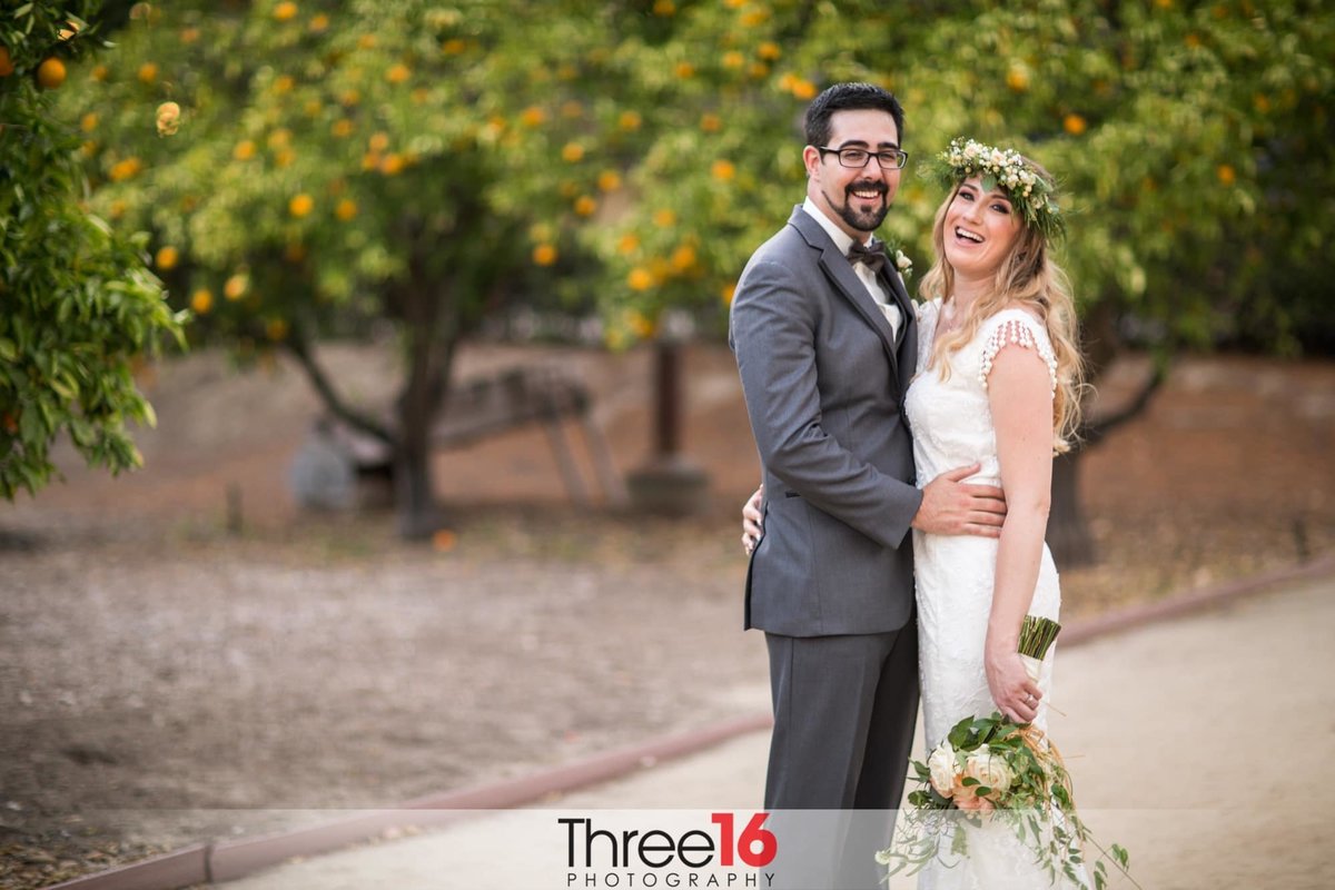 Bride and Groom pose for a photo