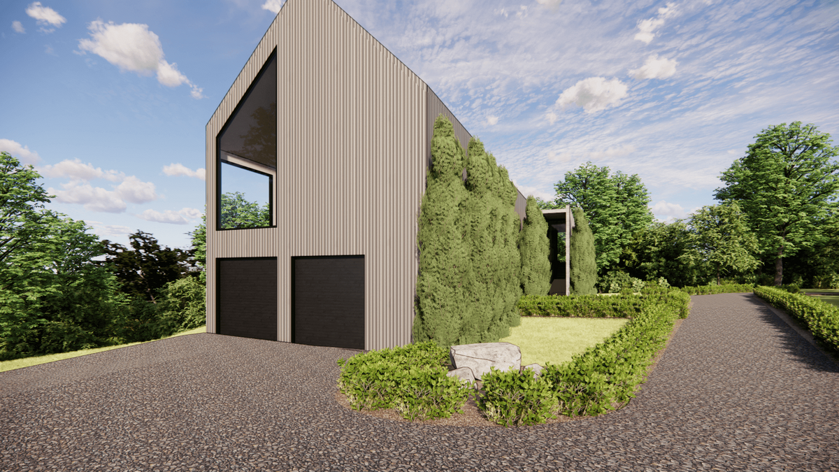 Modern house with large, angled windows and gray vertical siding. The building is surrounded by lush greenery and a neatly trimmed hedge lining a gravel driveway. The sky is partly cloudy.