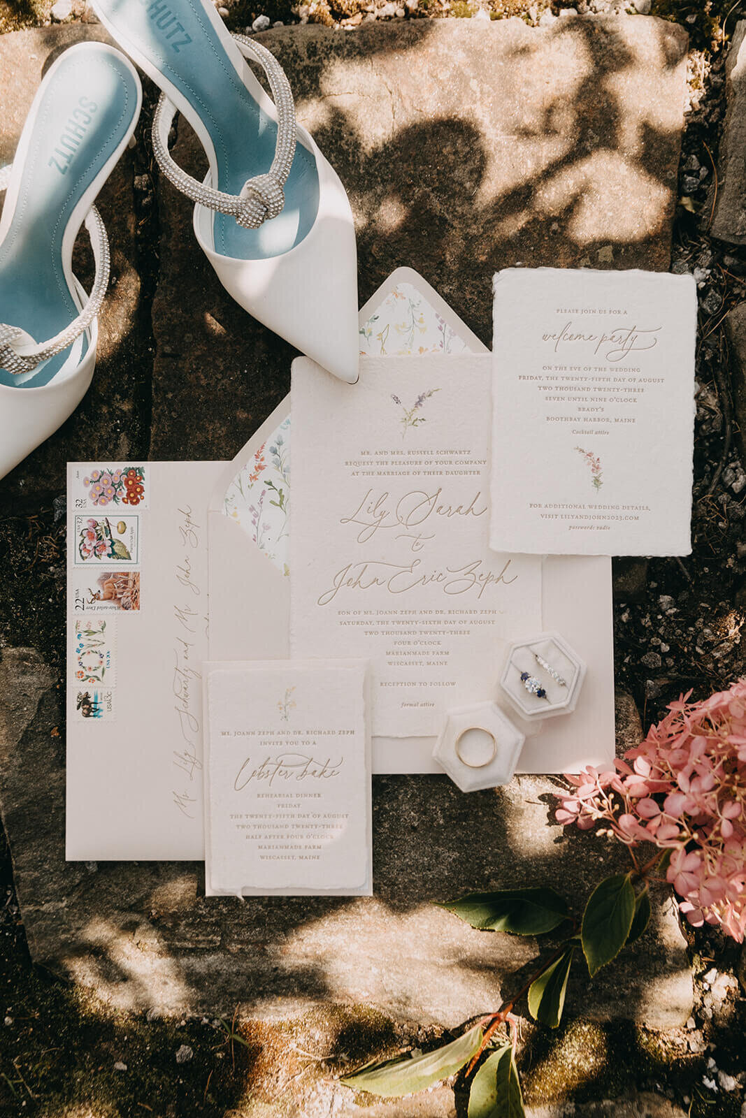 5.poeme-wedding-flatlay-invitations-rings-white-heels