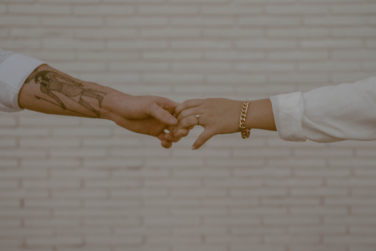 Detail hand shot engagement photographer