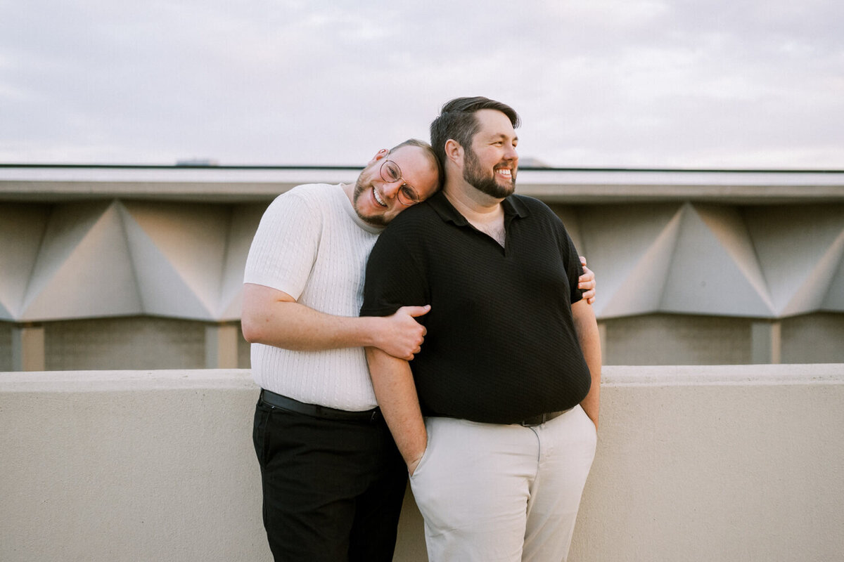 groom-squeezing-groom-from-behind