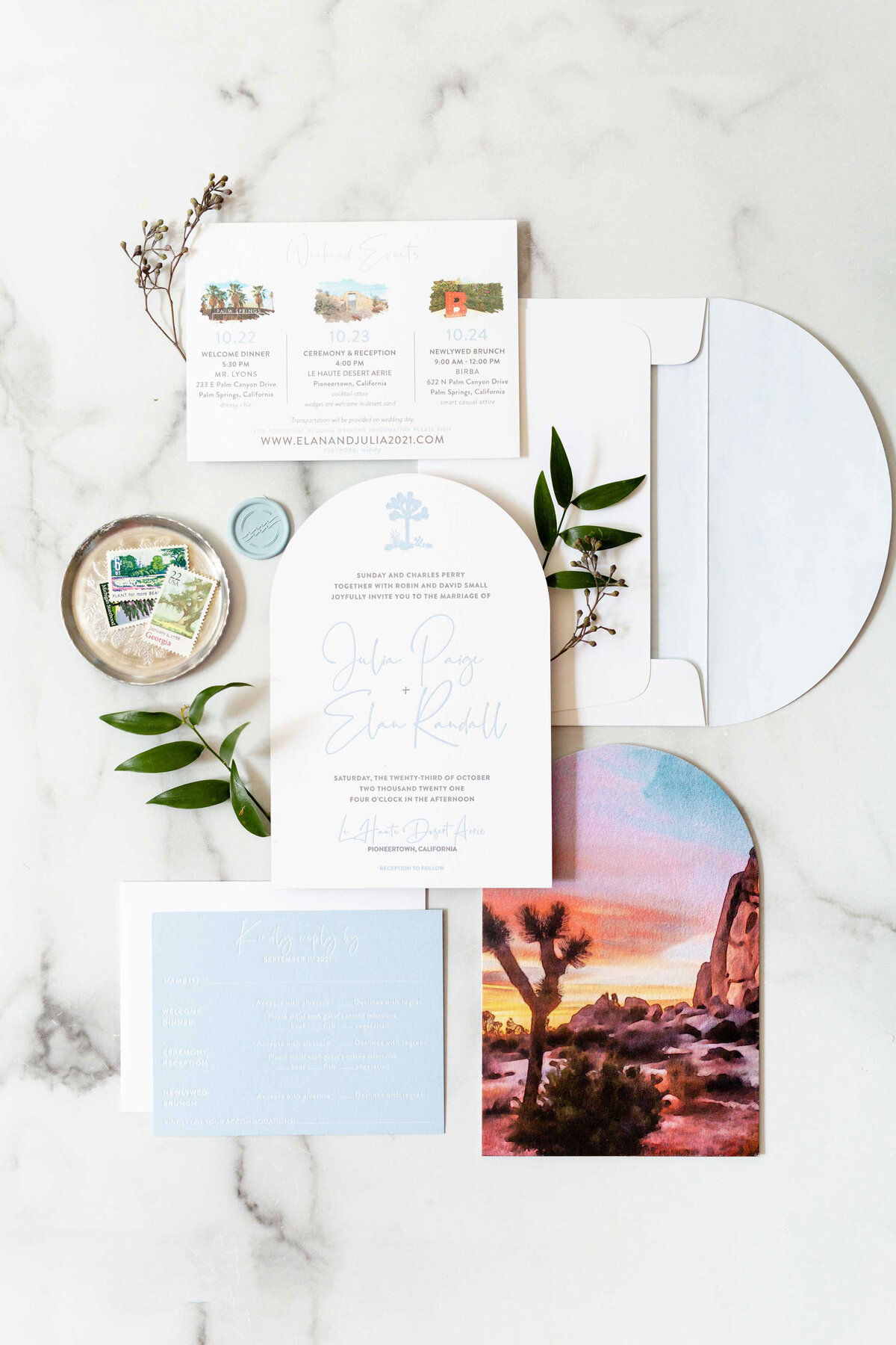 Joshua Tree arched wedding invitation with light blue and grey letterpress. Weekend events card with custom venue images