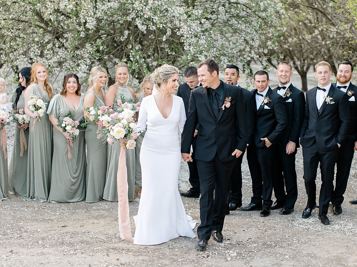 Emerald grace floral design wedding with Lauren Westra photography almond orchard bride and groom soft blush color palette central california weddings_2498