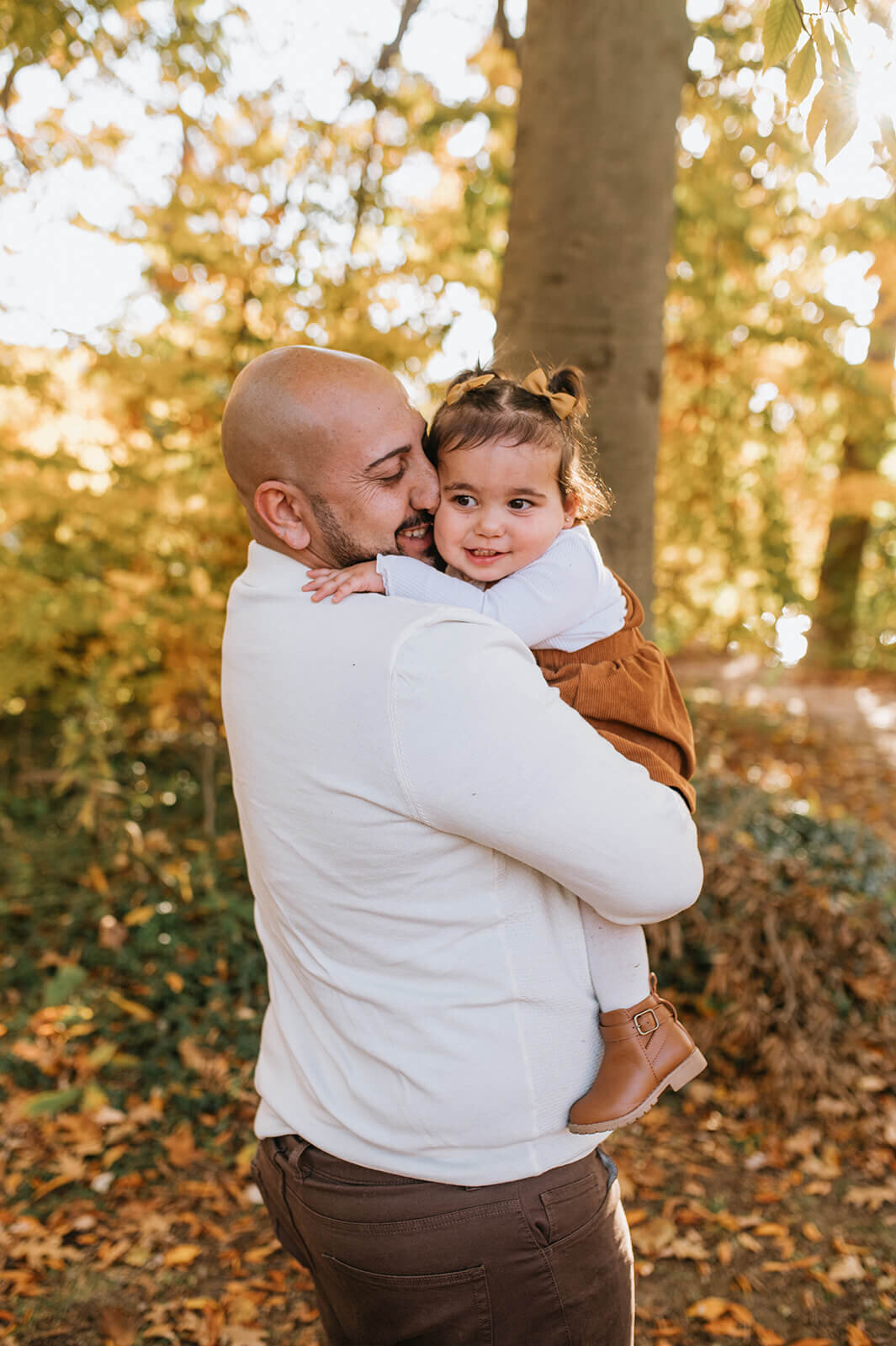 Father-holding-daughter