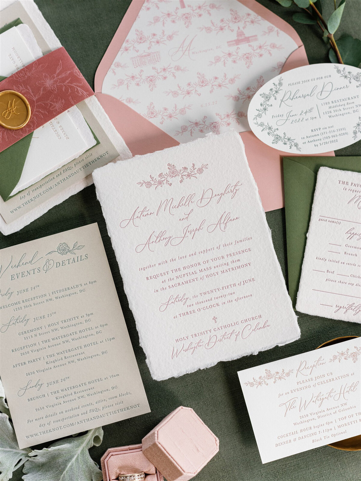 wedding details with invitation, menu, bands