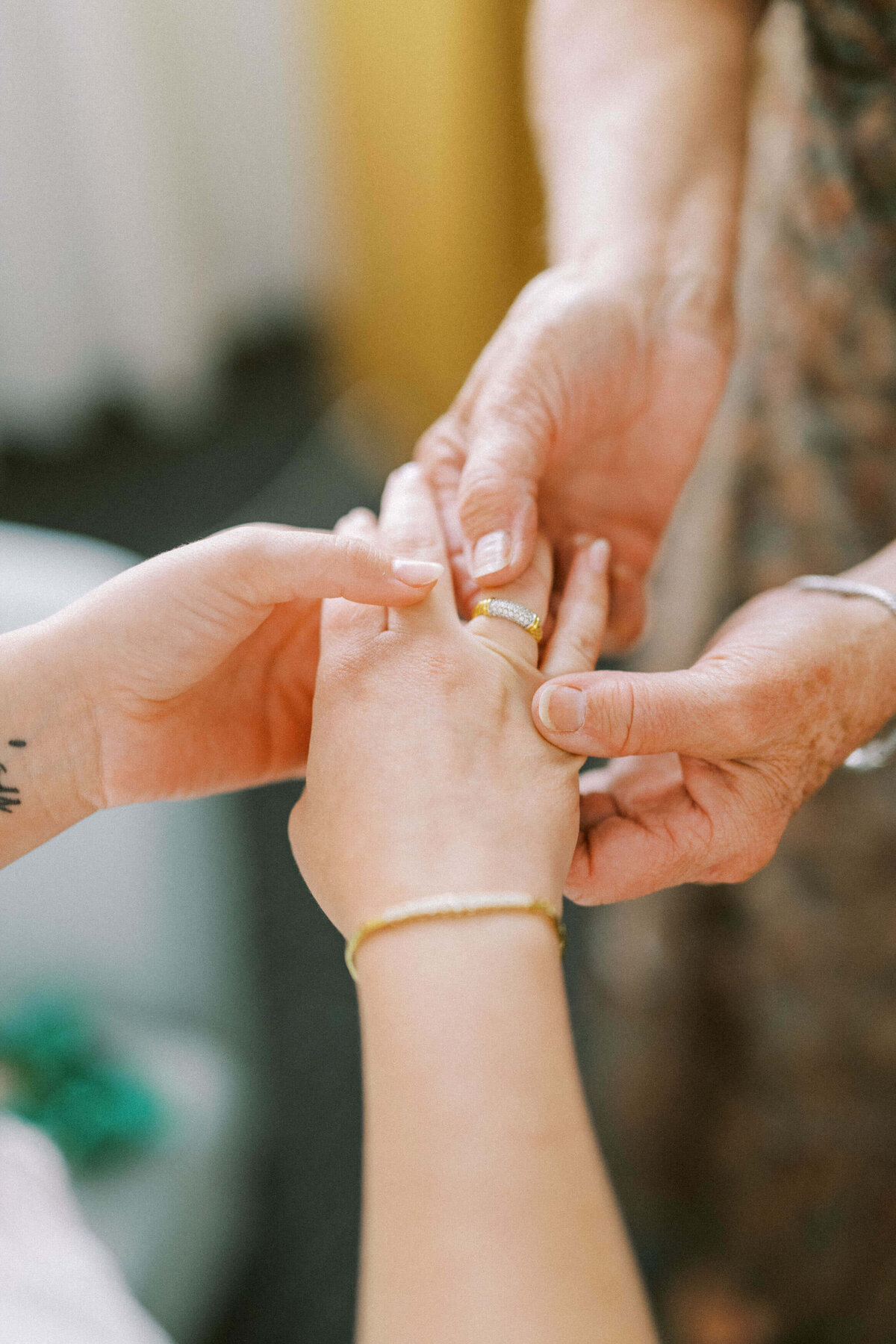 grandmother-hands-seeing-jewelry