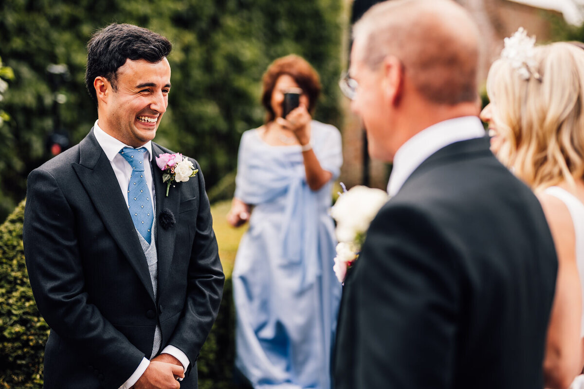 Groom reaction to seeing partner walk down the aisle