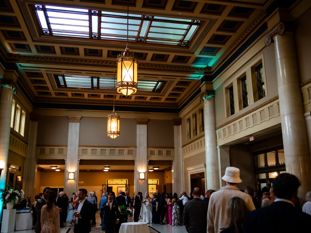cocktail hour photos of guests in lobby of Liuna Station