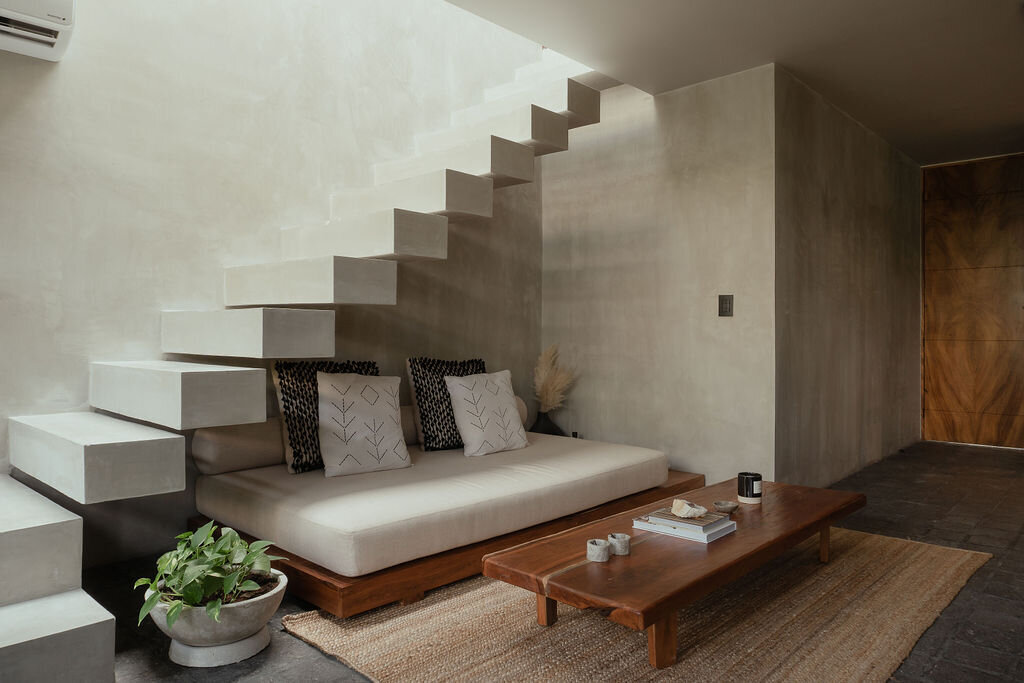 daybed-under-staircase-concrete-wood