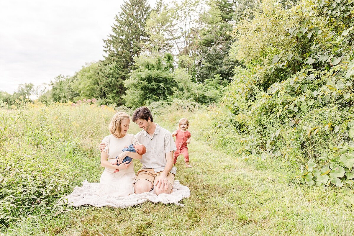 Outside  Newborn Photo Session with Sara Sniderman Photography  at Heard Farm Conservation Land, Wayland Massachusetts