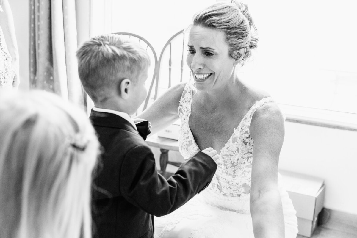 Bride hugging nephew at The Silver Knot in Ronan, MT