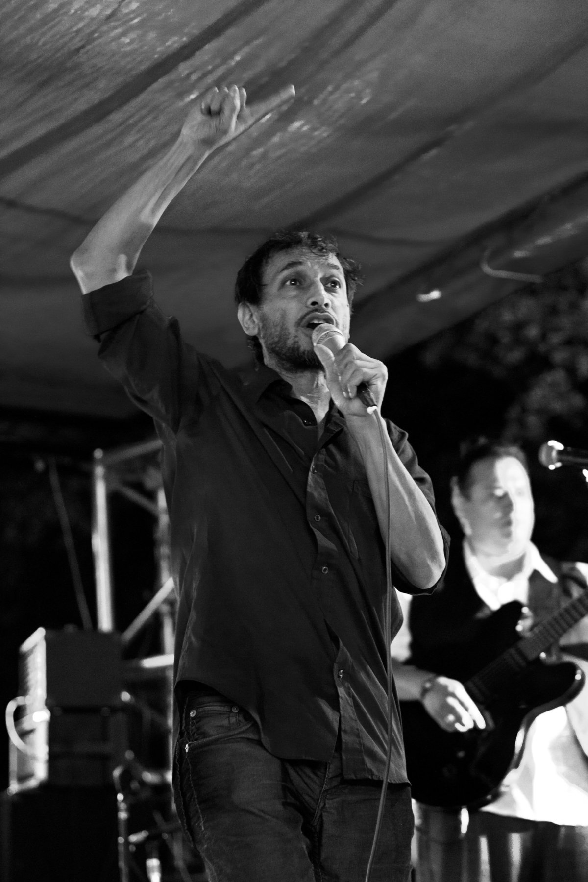 Actor Jesse Borrego singing with his band