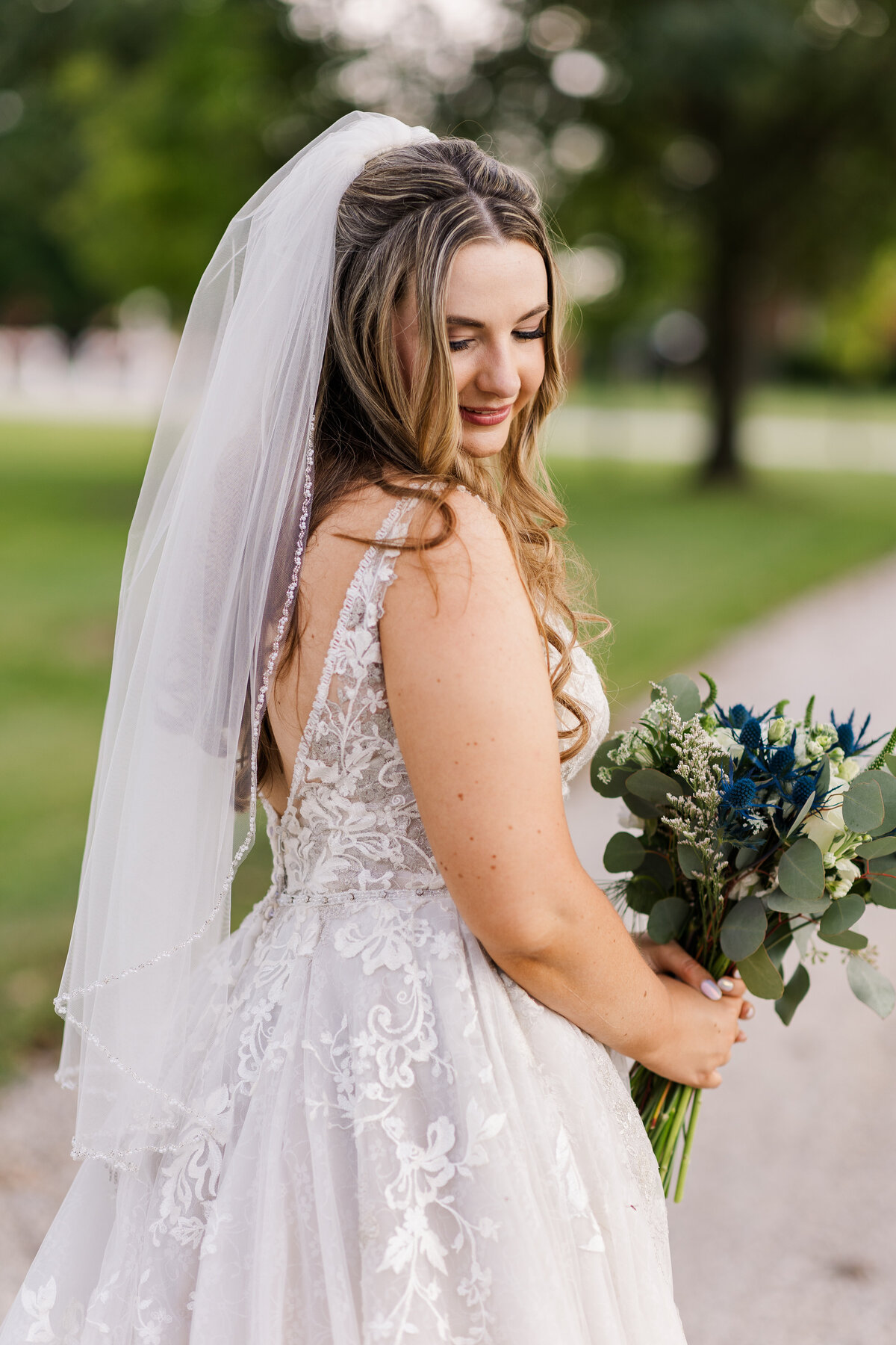 Portrait of a bride with flowers in Cincinnati, OH by Megan Pryll Photography