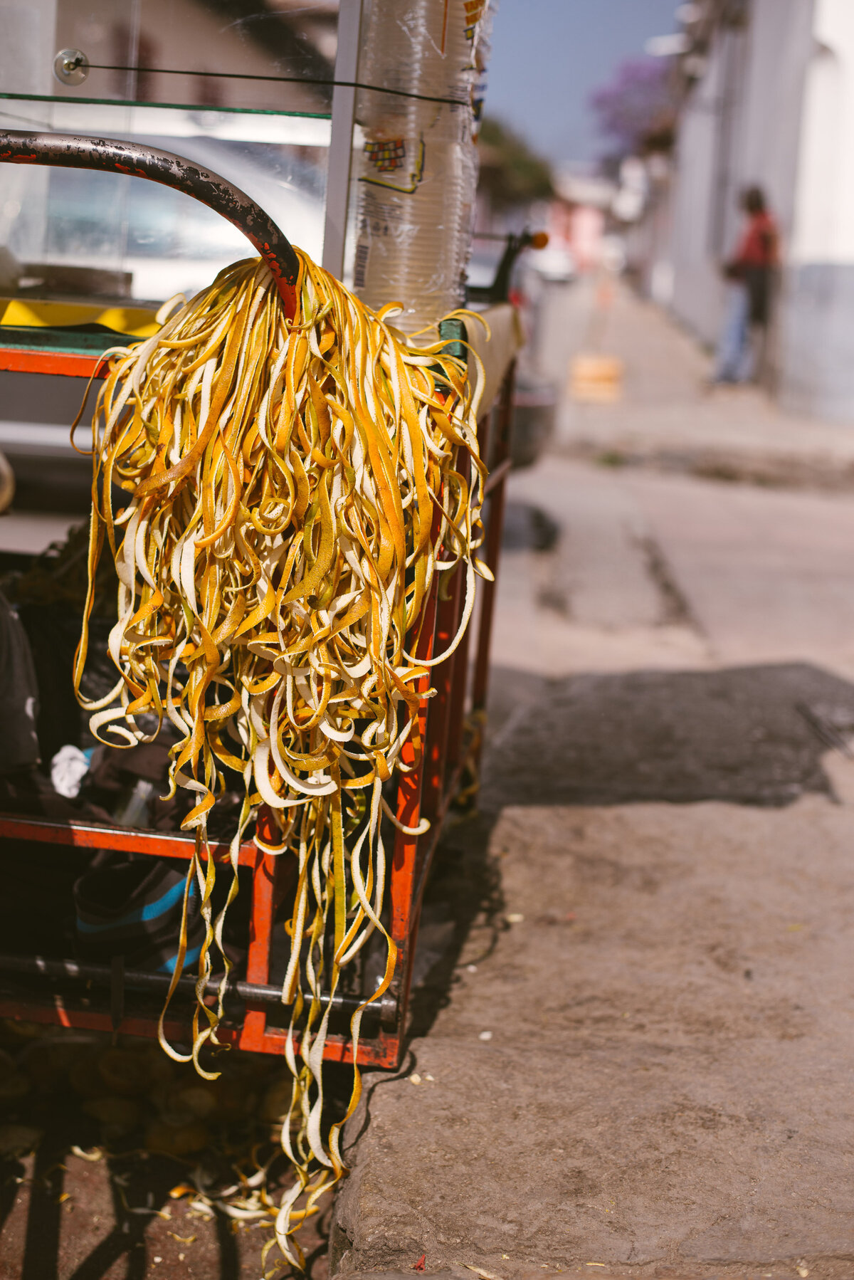 orange rinds on street cart in mexico