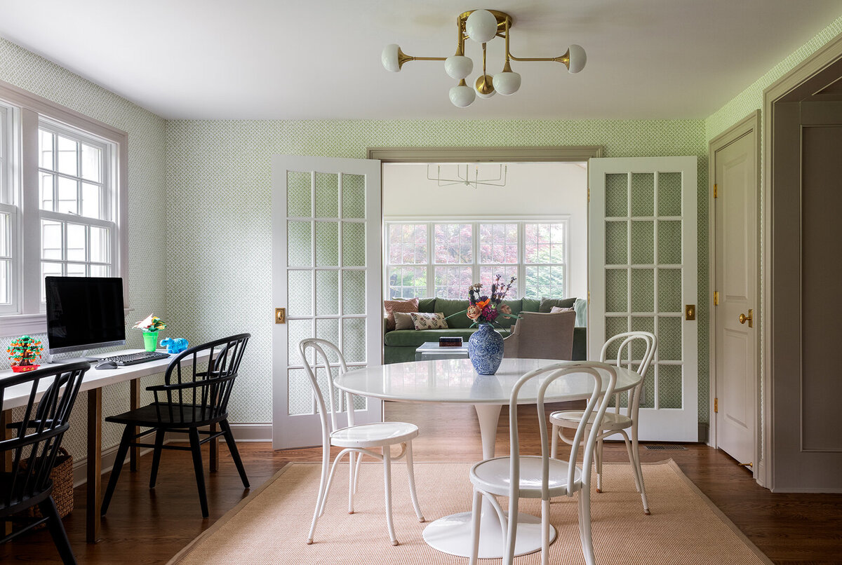 round table with french doors leading to the living room