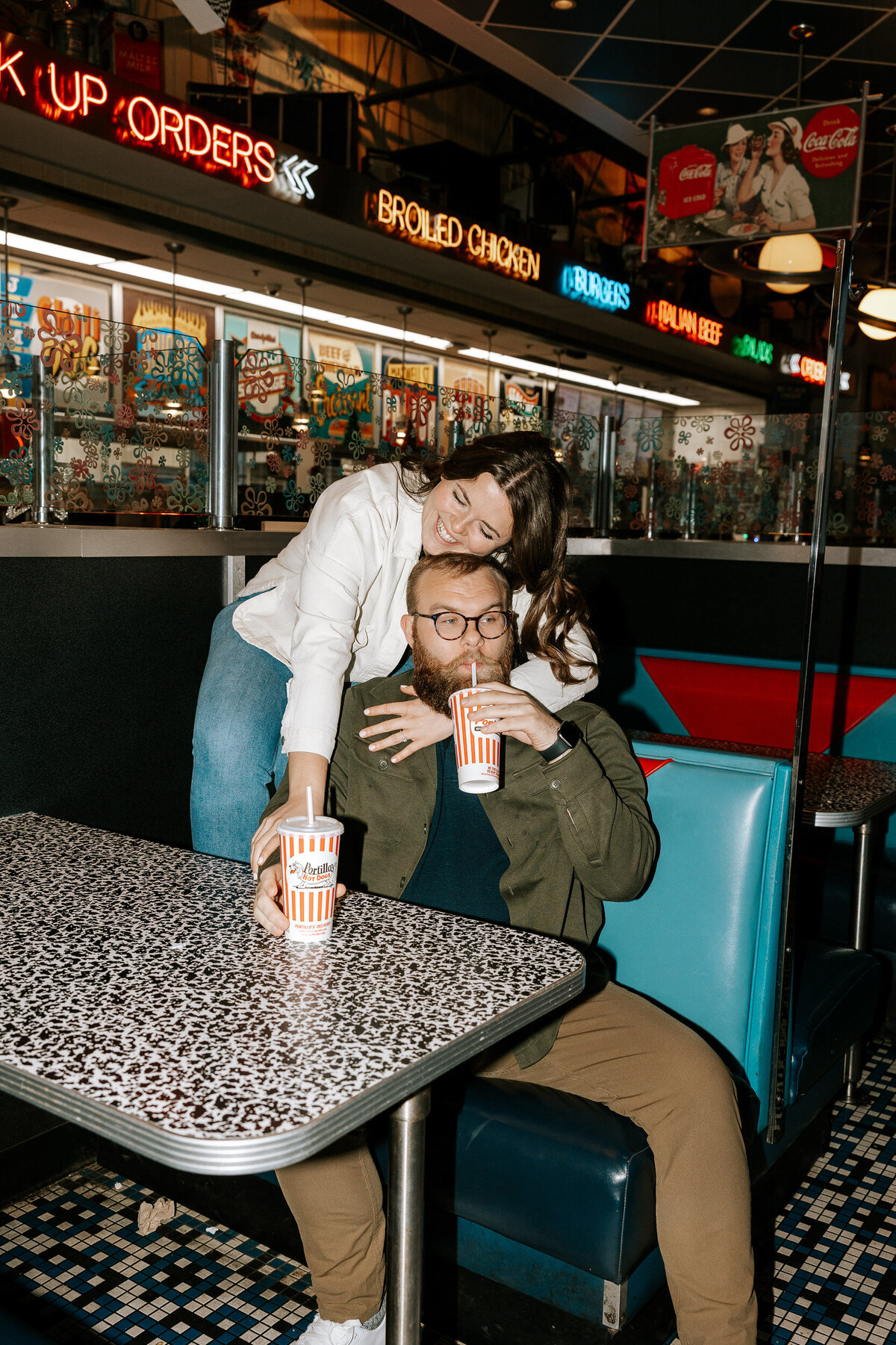 creative fun chicago flash engagement photos at Portillos Hotdogs-37-ed-lucy