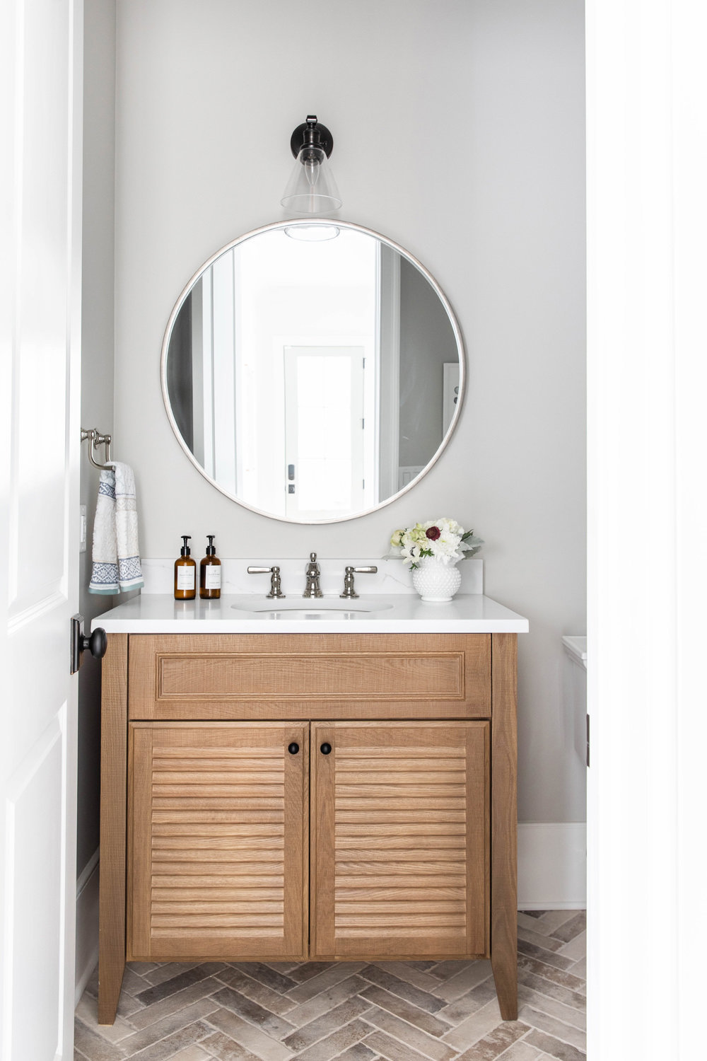 White-Oak-Louvered-Vanity-with-brick-herringbone-floor-1